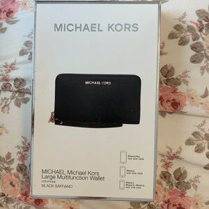 Michael Kors large multifunction wallet never used